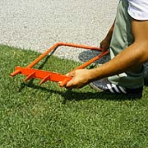 写真19．足踏み式の更新器具